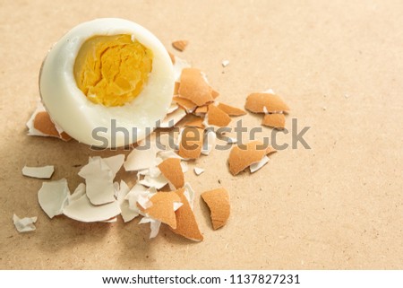 Egg on wooden table.