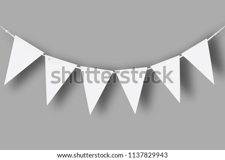 White paper bunting party flags isolated on gray background with natural shadows. Template Royalty-Free Stock Photo #1137829943