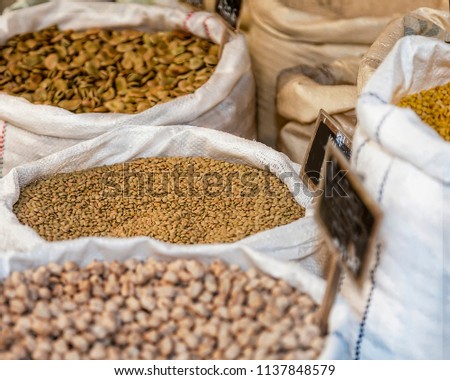 A mixture of dry beans in sacks. Focus in the middle. Stock Image.
