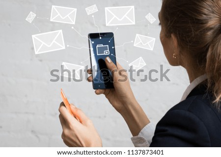 Businessman presses button file network mail on phone credit card.