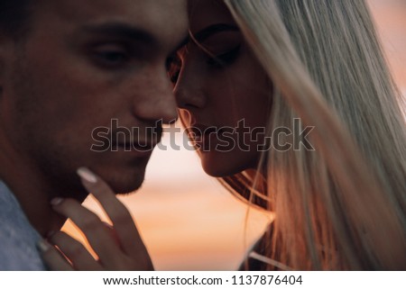 Couple in love.Couple together.Couple at sunset.Love.Feeling.Silhouette photo