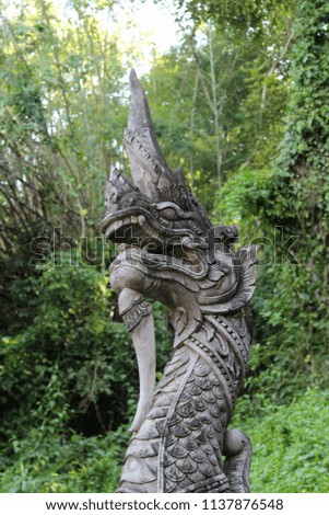 Ancient naga statue in Wat Analyo Thipayaram, Phayao, Northern Thailand.