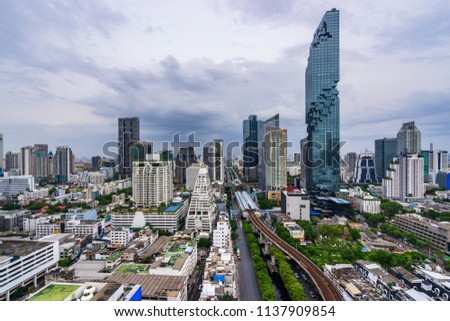 urban cityscape in metropolis with cloud in daytime and skyline movement