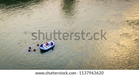 Aerial view of people having fun during rafting in the river in Rishikesh India