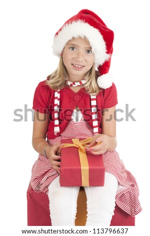 girl with christmas hat and present, isolated on white background