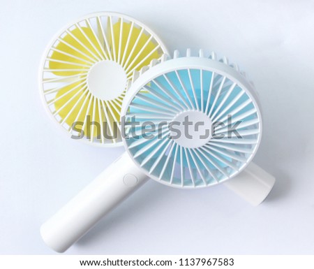 two Portable Mini Fan isolated on white background