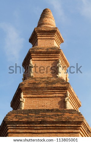 Ancient pagoda with blue sky background.