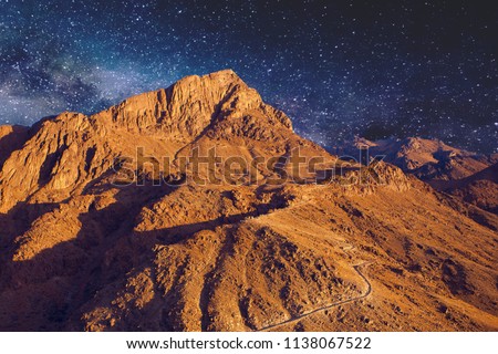 Amazing Sunrise at Sinai Mountain, Mount Moses with a Bedouin, Beautiful view from the mountain	 Royalty-Free Stock Photo #1138067522