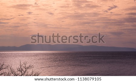 Landscape colorful view of blue sky with clouds and a sea with rough surface (small waves).. Use for background.