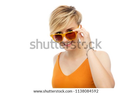 summer fashion, style and eyewear concept - portrait of happy smiling young woman in sunglasses over white background