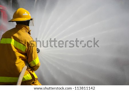 Firefighter fighting For A Fire Attack, During A Training Exercise