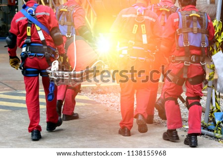 Close-up group of Rescue fireman team with safety equipment ,harness and safety belts,Rescue concept. Royalty-Free Stock Photo #1138155968