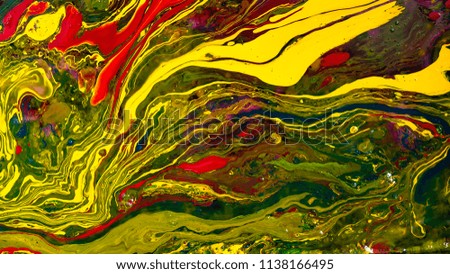 Photo of oil colors mixing water abstract background