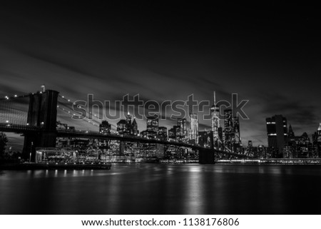 Brooklyn Bridge in black and white shot from Pebble Beach in Dumbo