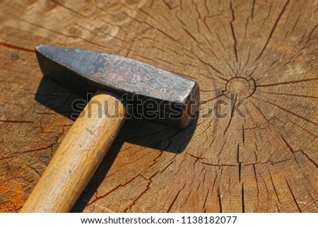 Hammer on a wooden surface.