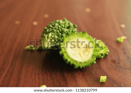 Sliced & Chopped Bitter Gourd  on the wooden background free royalty free stock images