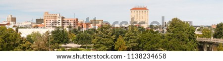 A bright sunny summer day over the urban center of San Angelo in West Texas USA Royalty-Free Stock Photo #1138234658