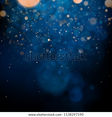 Blurred bokeh light on dark blue background. Christmas and New Year holidays template. Abstract glitter defocused blinking stars and sparks. EPS 10 Royalty-Free Stock Photo #1138297190