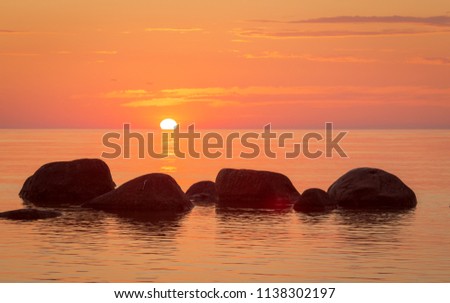 Orange sunset over the Baltic sea. Estonia.
