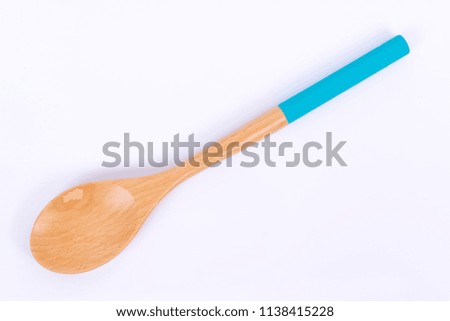 new wooden spoon isolated on a white background