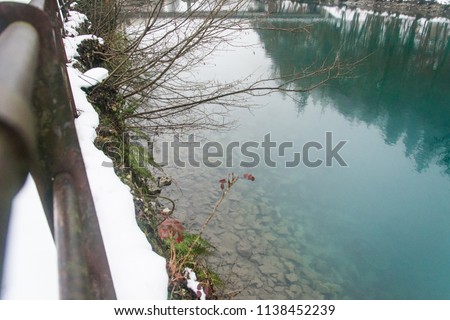 Interlaken switzerland. Landcape view of beautiful lake and old town Interlaken in winter day with snow, is a traditional resort town in the mountainous Bernese Oberland region of central Switzerland