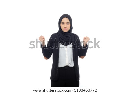 Potrait of a angry casual woman show warning  over white background.