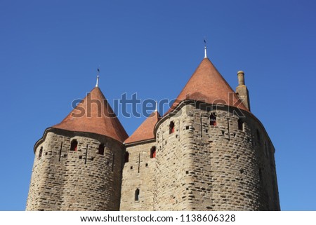 medieval towers on the blue sky background