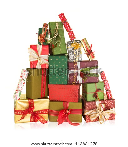 Big stack of christmas presents in the shape of a high mountain Royalty-Free Stock Photo #113861278