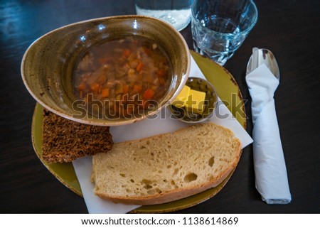 Traditional Icelandic lamb soup, bread and butter, summer time, indoor, Iceland