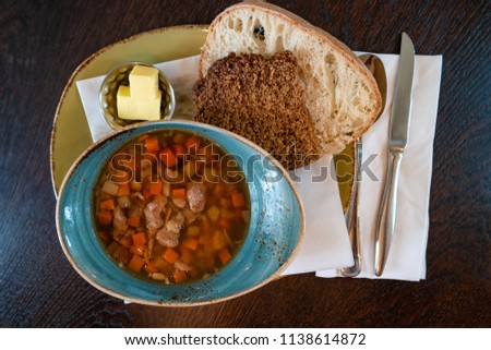 Traditional Icelandic lamb soup, bread and butter, summer time, indoor, Iceland