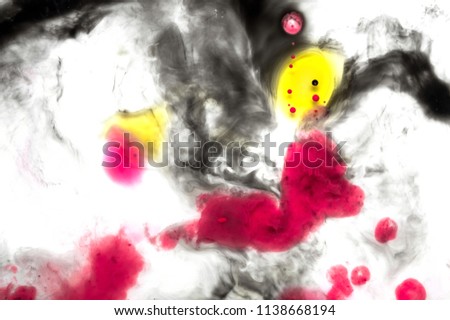 Abstract ink background. Moving liquid paint in water. Black thi