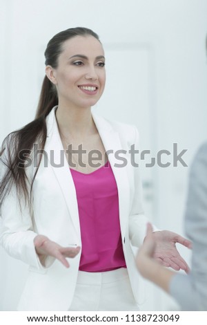 experienced female Manager talking to a customer