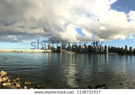 Stanley Park seawall and Vancouver city skyline
