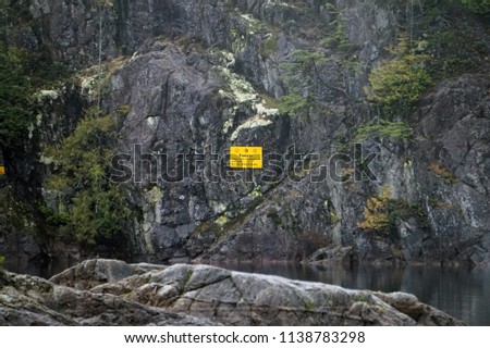                                Danger Sign on Cliff