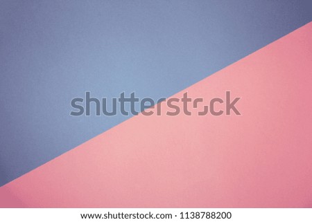 A background divided diagonally by blue and pink colors