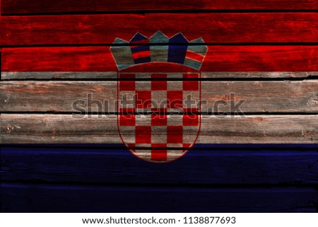 Flag of Croatia on a wood wall background.