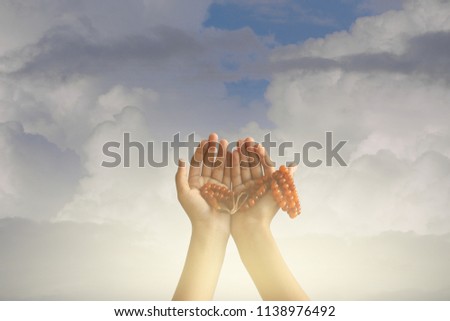 Empty Hands Muslim Pray for Healing Disaster Hope Prayer,Faith God concept
Divine blessing,Divine blessing,Holy spirit concept
Concept: hands of the hungry of help, Ramadan festival 1443,opportunity
