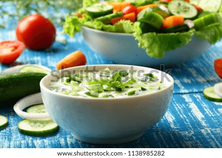 Healthy vegan diet food- cucumber yogurt dip salad. 
