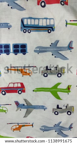 my bed sheet filled with cars  planes