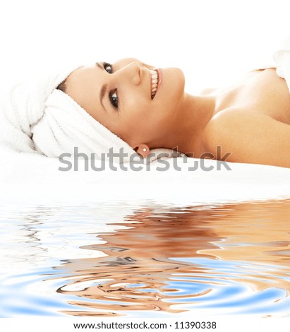 picture of happy lady relaxing on white sand