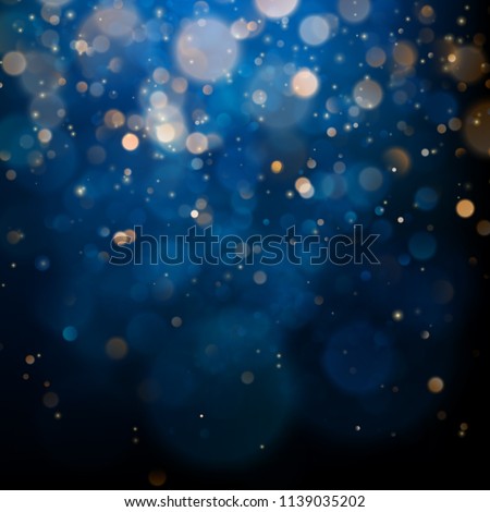 Blurred bokeh light on dark blue background. Christmas and New Year holidays template. Abstract glitter defocused blinking stars and sparks. EPS 10 Royalty-Free Stock Photo #1139035202