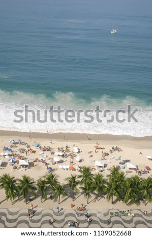 ocean, beach and palms at the Copacabana beach Rio de Janeiro Brazil, drone photo