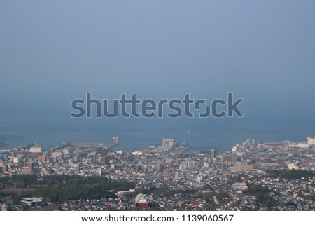 The city landscape under clear blue sky 