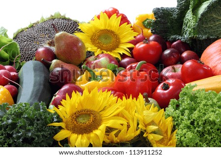 Closeup of vegetables with cabbage and sunflower