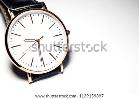 Beautiful wristwatch and white backdrop