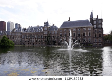 Dutch Parliament buildings (Binnenhof Palace) along the Hofvijver pond in The Hague, Netherlands.