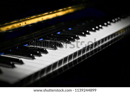 Piano keyboard and piano keys in the dark. Music concept.