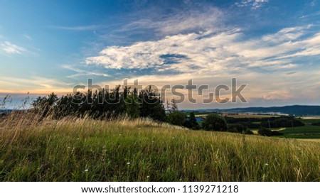 Meadow, forest and sky. Moravian landscape Boskovice.