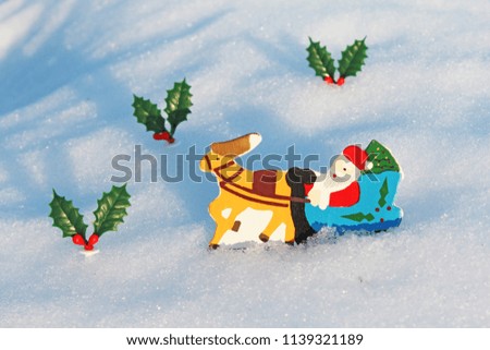 Christmas Background.Santa Claus riding a sleigh.