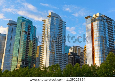Vancouver downtown panorama at sunrise in summer. Modern buildings architecture near harbor waterfront in Vancouver BC, Canada.
